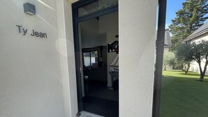 A building entrance with a nameplate reading "Ty Jean." - House for 4/5 people, beaches and shops 400 m away (Arradon)