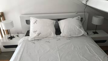 2 dormitorios, tabla de planchar con plancha, wifi gratis y ropa de cama
