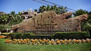 A large rock with the text "Walt Disney World Resorts" and "Welcome" on it. - Welk Resort Villas - Winter Wonderland Weekend (Escondido)