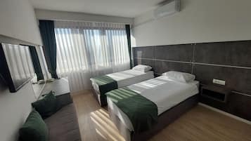 Deluxe Double or Twin Room, Non Smoking, City View | 2 bedrooms, desk, free WiFi, bed sheets