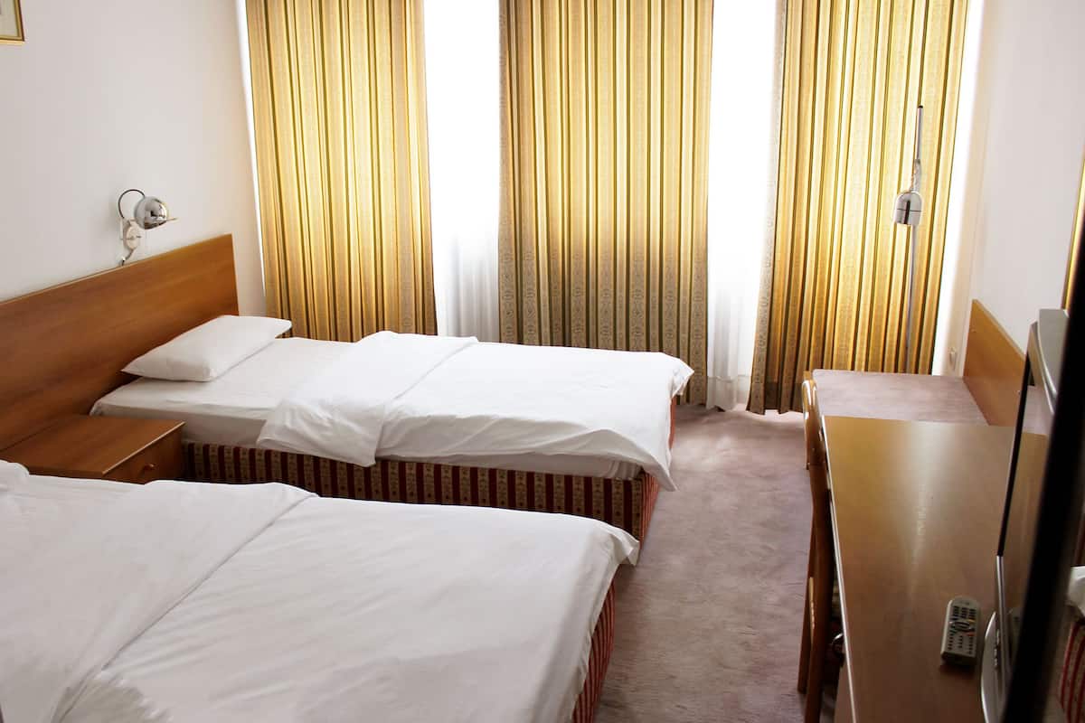 Classic Double or Twin Room, Non Smoking | 2 bedrooms, desk, free WiFi, bed sheets