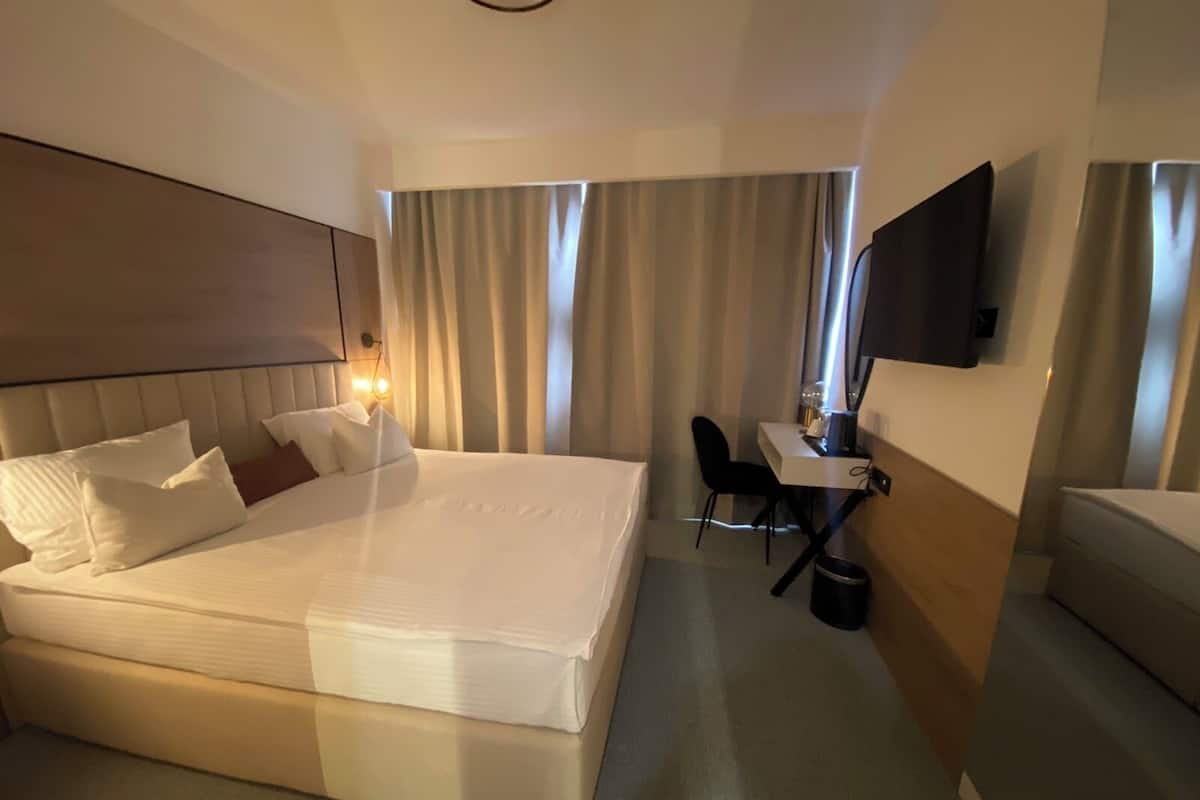 Comfort Double or Twin Room, 2 Single Beds, Non Smoking | 2 bedrooms, desk, free WiFi, bed sheets