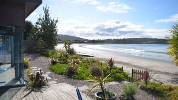 On the beach, sun loungers, beach towels