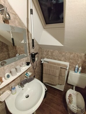 Hair dryer, towels, soap, toilet paper