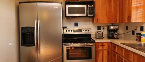 Microwave, dishwasher, coffee/tea maker, toaster