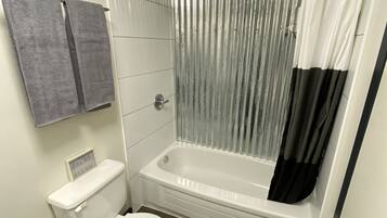 Room, 1 Queen Bed | Bathroom | Shower, rainfall showerhead, towels, soap