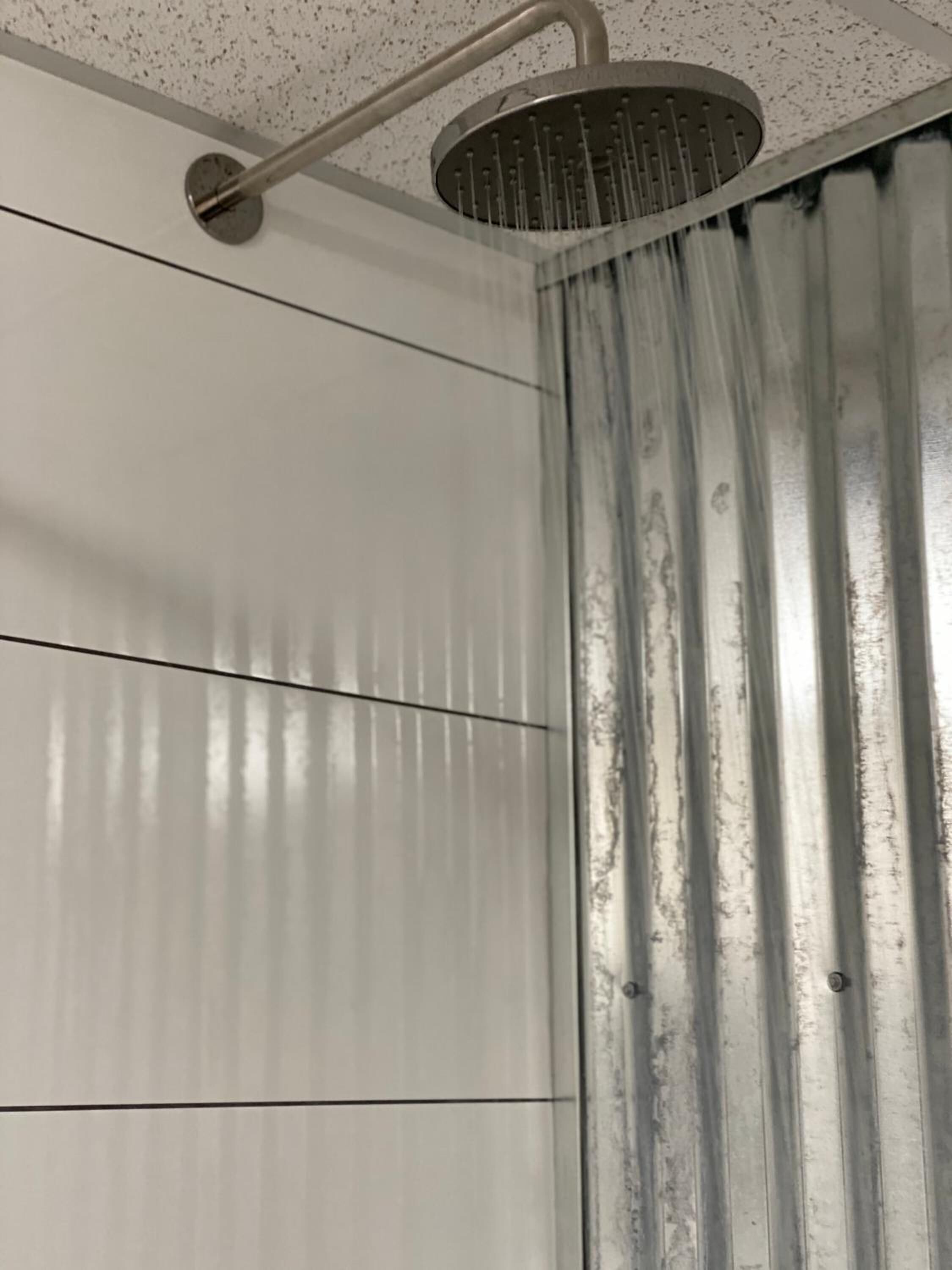 shower, rainfall showerhead, towels, soap