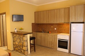 Apartment (Sapfo Ground floor) | Living area | Flat-screen TV - Alkionis (Lefkada)