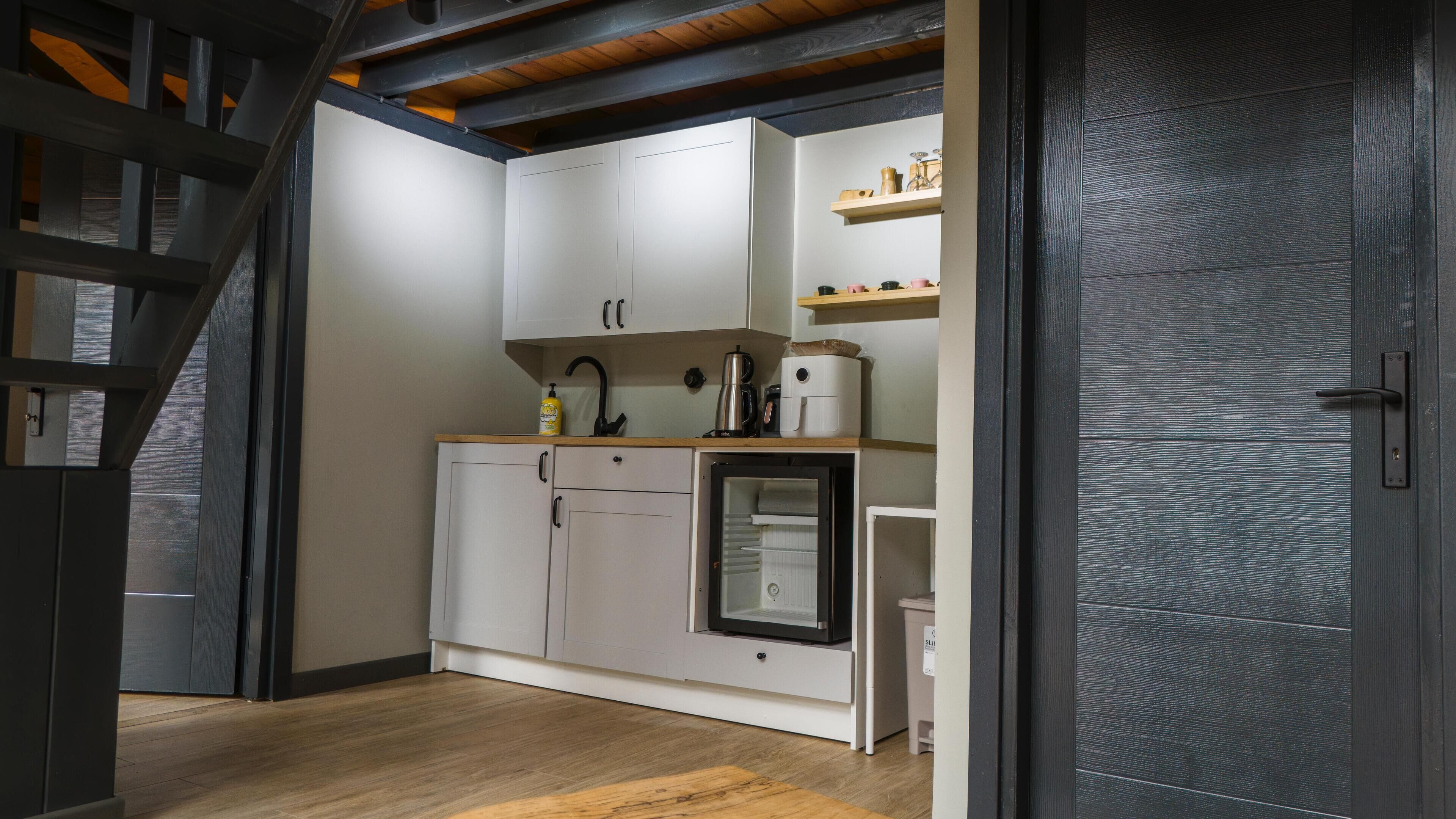 luxury bungalow, 2 bedrooms | private kitchen | high chair