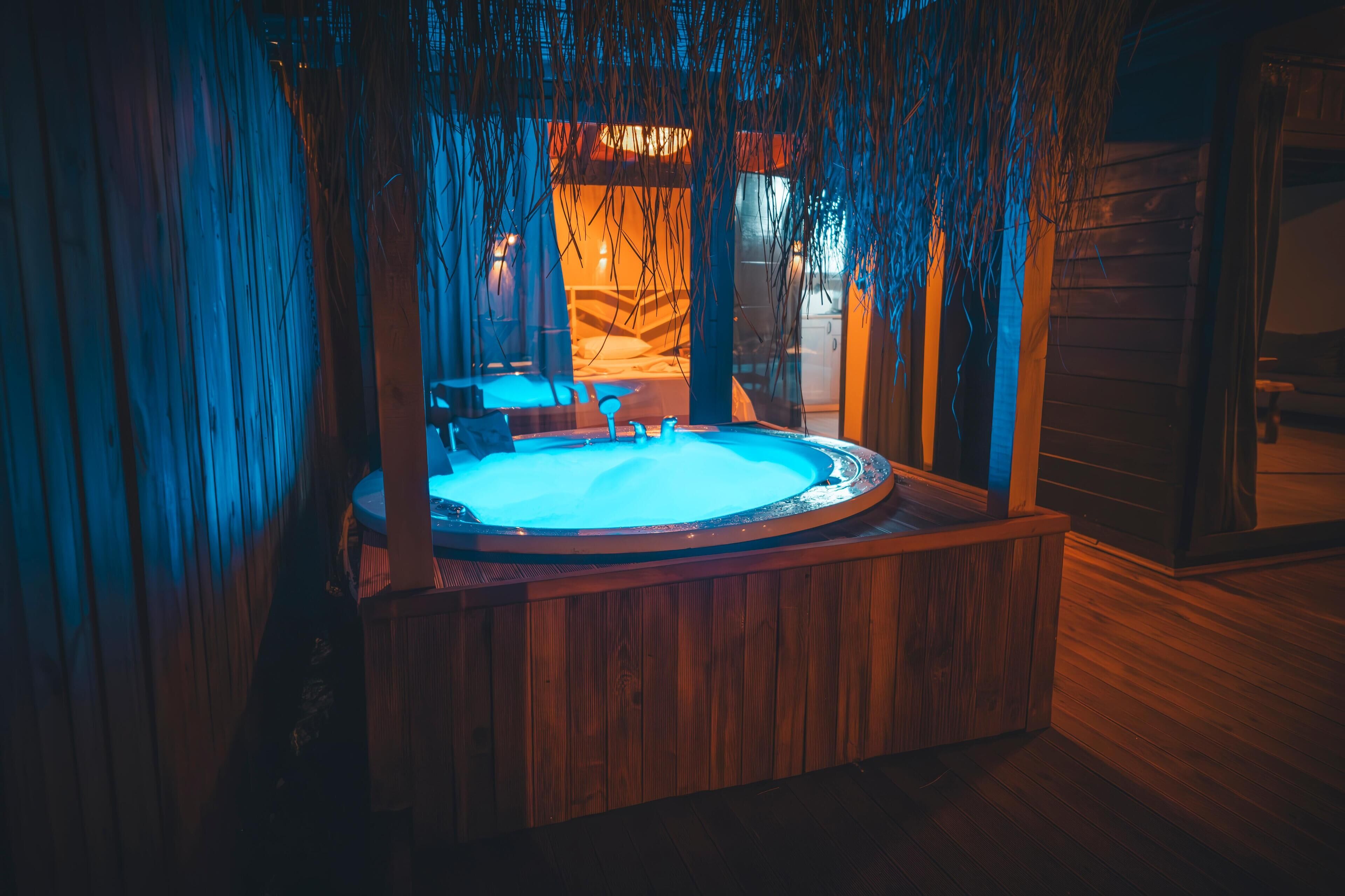 luxury bungalow, 2 bedrooms | living area | lcd tv, fireplace