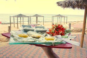 Breakfast, lunch, dinner served; local and international cuisine 