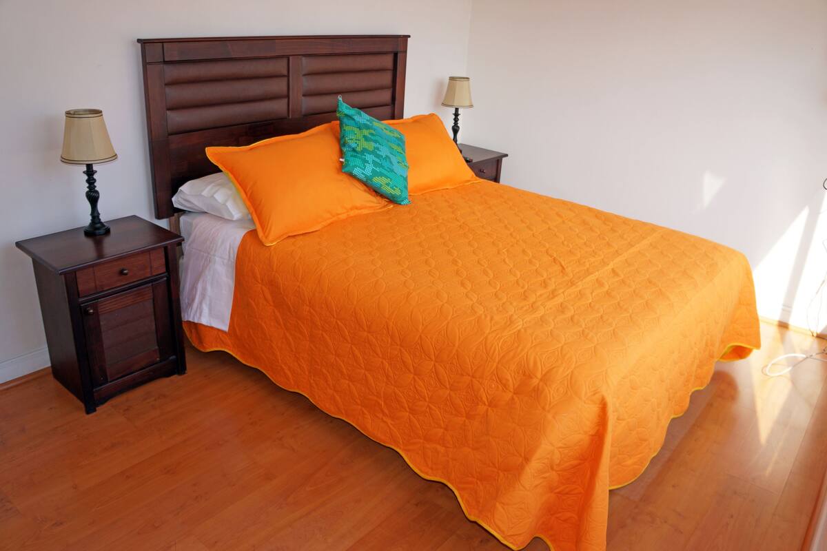 Premium bedding, blackout drapes, iron/ironing board (on request)