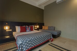 Deluxe Triple Room, Multiple Beds | Premium bedding, in-room safe, desk, laptop workspace - Wasabi Hotel (Canggu)