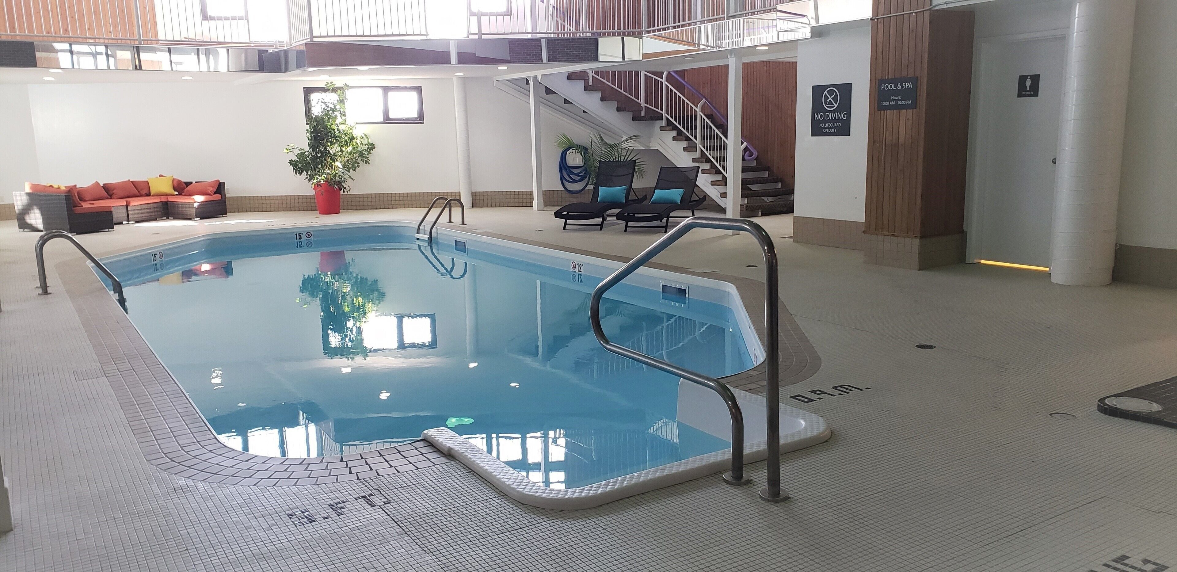 indoor pool, open 10:00 am to 10:00 pm, pool loungers