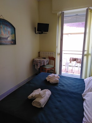 Desk, free WiFi, bed sheets