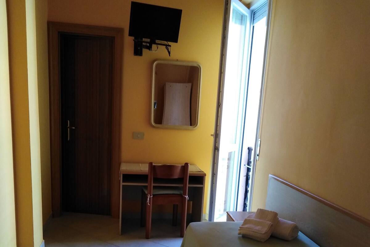Desk, free WiFi, bed sheets
