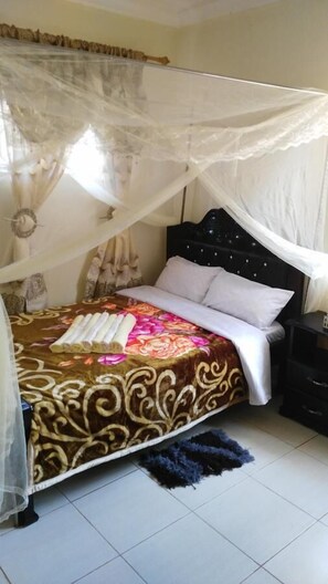 Standard Double or Twin Room, Non Smoking, Garden View | Desk, blackout curtains, iron/ironing board, free WiFi - Amari Comfort Homes (Kampala)