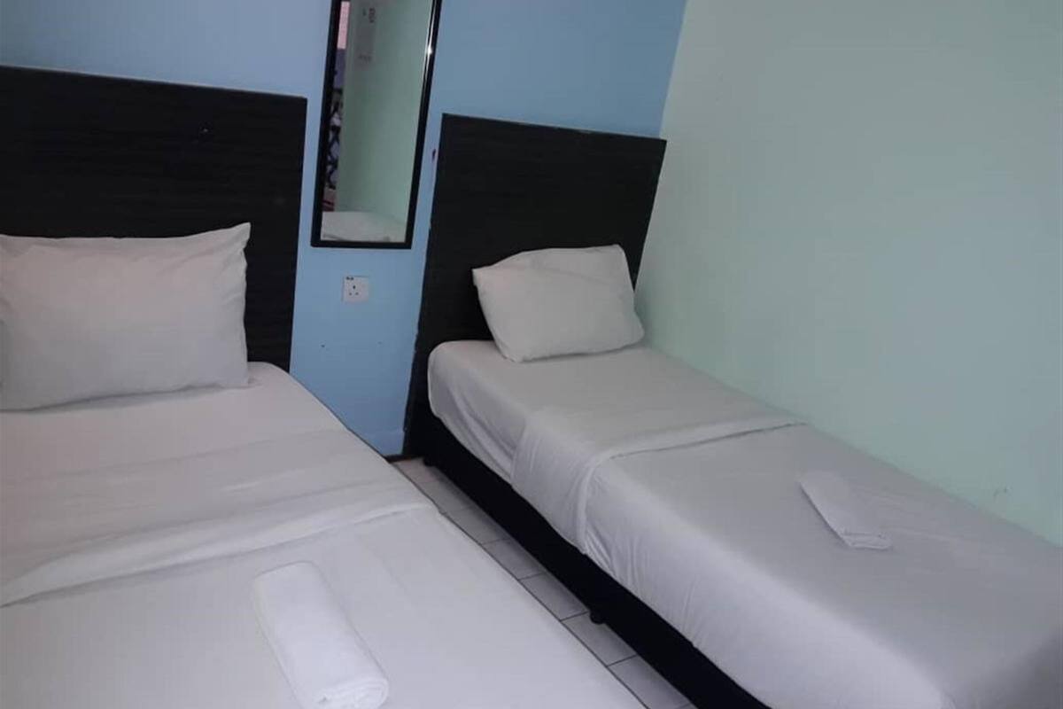 Habitación estándar con 2 camas individuales | Wifi gratis y ropa de cama
