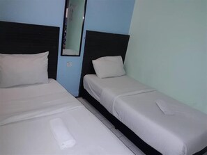 Habitación estándar con 2 camas individuales | Wifi gratis y ropa de cama