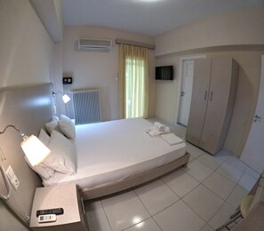 Panoramic Apartment, Multiple Bedrooms | 2 bedrooms, Egyptian cotton sheets, premium bedding, Select Comfort beds -  Eleni Kandilari Rooms (Agia)