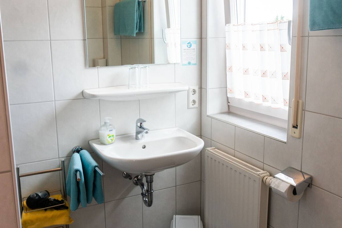 comfort double room | bathroom | shower, hair dryer, towels, soap