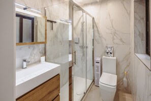 Bathtub, hair dryer, towels