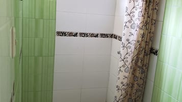 Shower, rainfall showerhead, towels