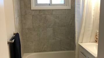 Bungalow, Multiple Beds, Non Smoking | Bathroom | Combined shower/bathtub, hair dryer, towels