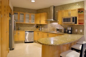 Fridge, microwave, oven, stovetop - Beachfront Luxury Condo (Nuevo Vallarta)