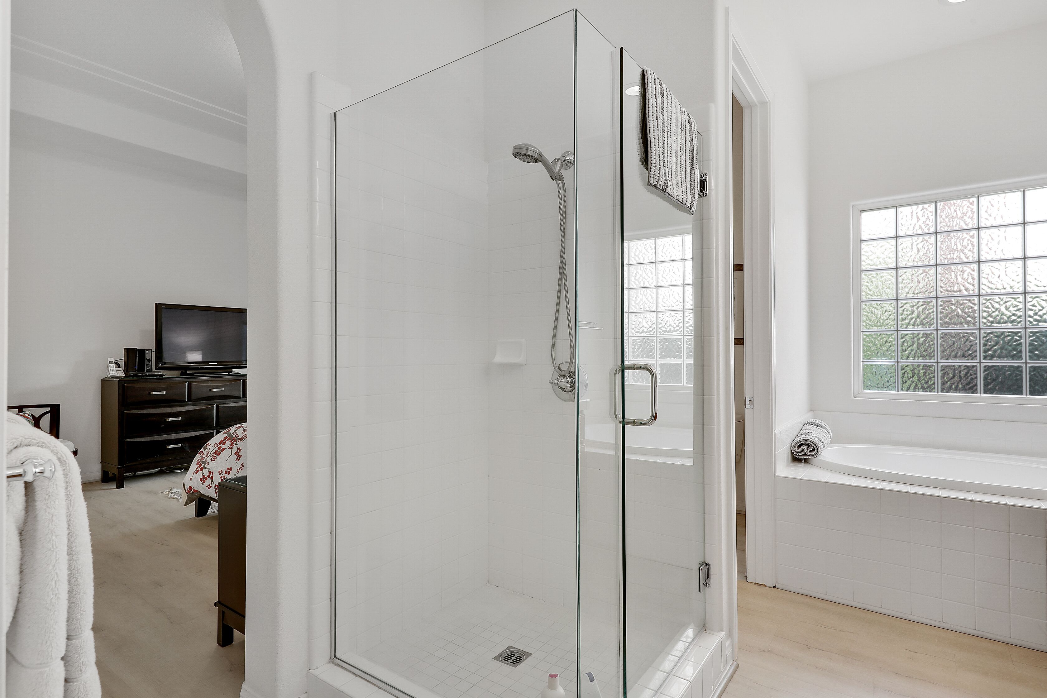 Bathtub, hair dryer, towels, soap