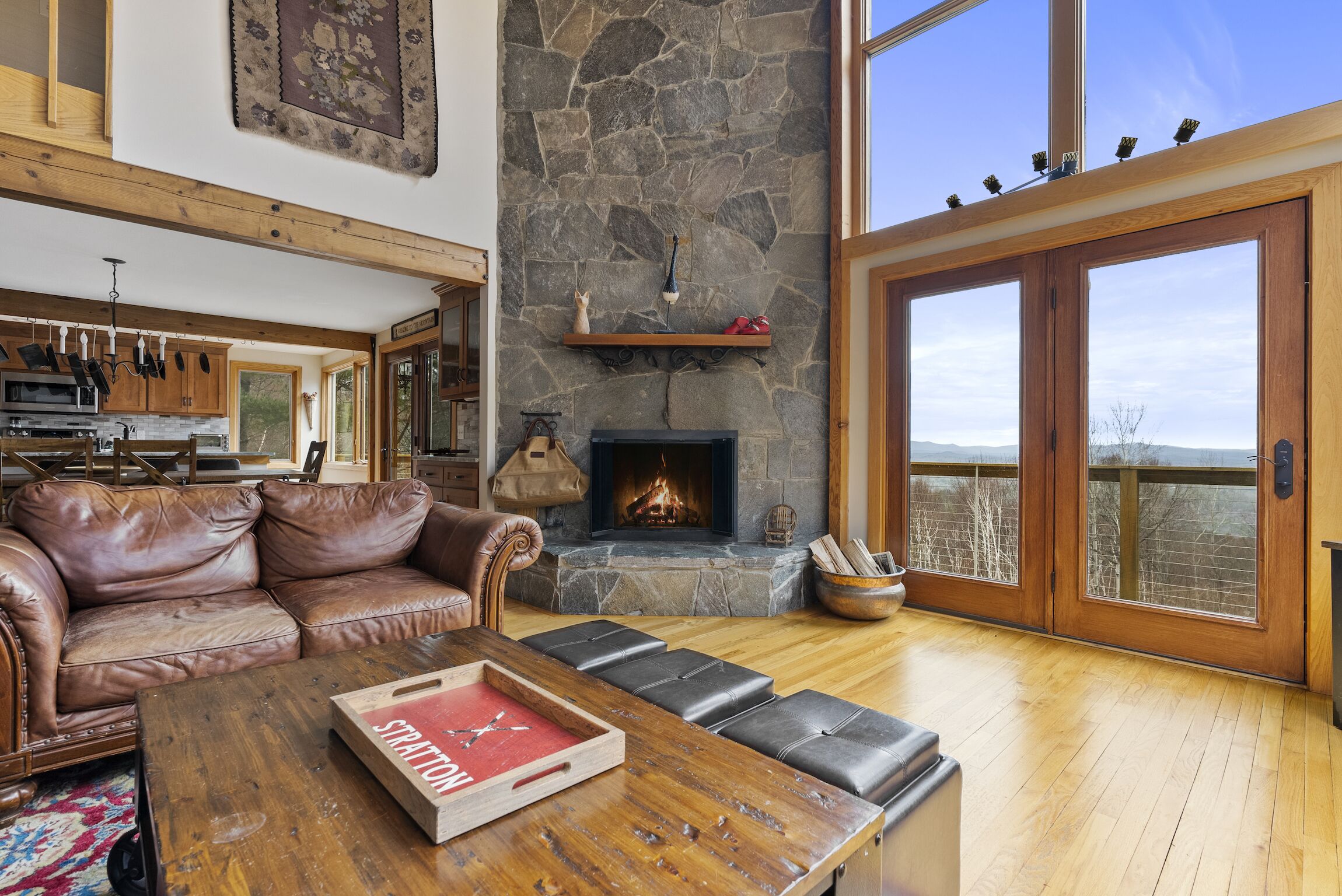 Enjoy the 26ft fireplace with a view!