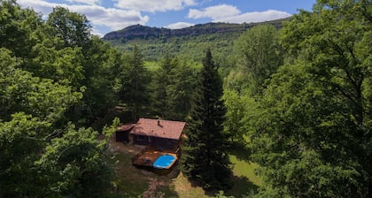 Chalet by the river with wooded park & heated swimming pool in St Antonin Noble Val, France