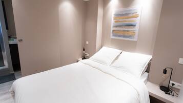 1 habitación, insonorización, tabla de planchar con plancha y wifi