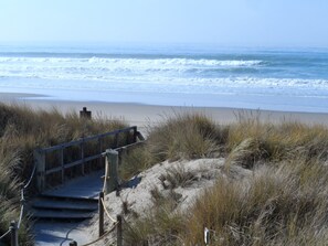 On the beach, sun loungers, beach towels
