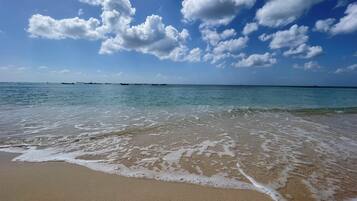 En la playa, toallas de playa