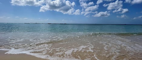 En la playa, toallas de playa