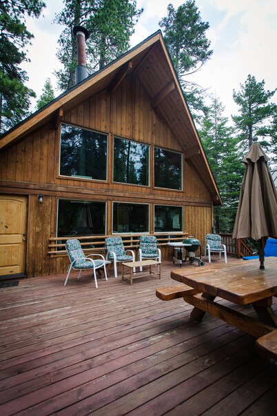 A super cabin on Tahoe's West Shore with PRIVATE BEACH RIGHTS. Up against forest
