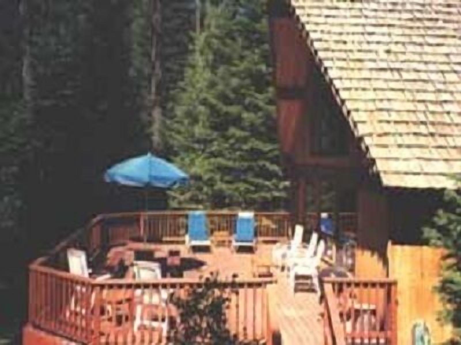 A super cabin on Tahoe's West Shore with PRIVATE BEACH RIGHTS. Up against forest