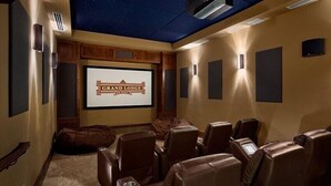 A home theater room with a starry ceiling, a large screen displaying "Grand Lodge," and multiple leather recliners. - Breckenridge Christmas & New Year weeks 2021-2022 email (Breckenridge)