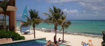 Luxurious Beachfront Two Bedroom Condo in Town!!!