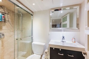 Shower, hair dryer, towels, soap