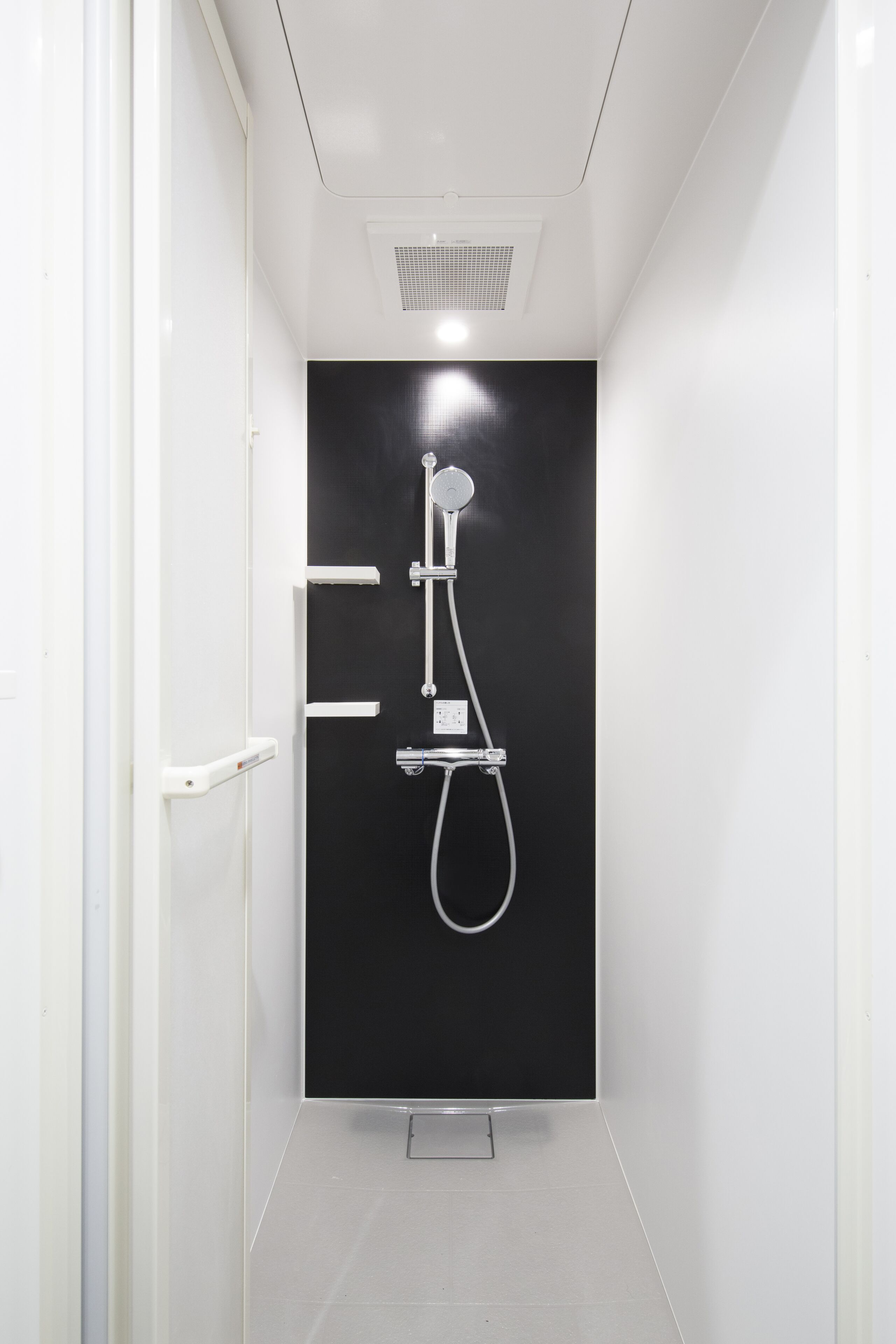 shower, hair dryer, bathrobes, slippers