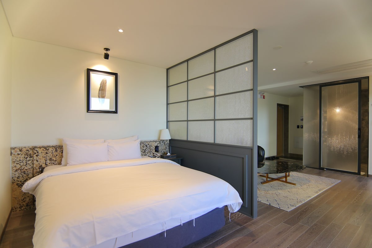 Suite, terrasse | 1 chambre, literie de qualité supérieure, couette en duvet d'oie