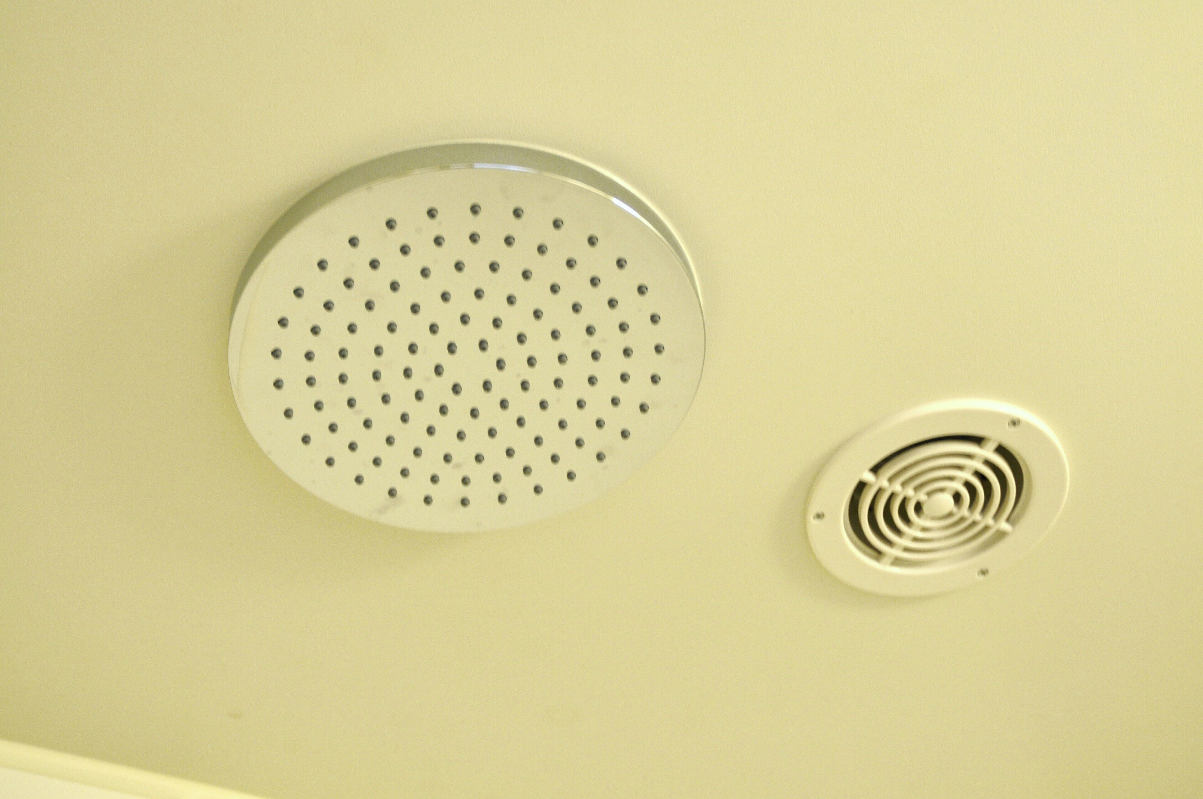 combined shower/bathtub, deep-soaking bathtub, rainfall showerhead
