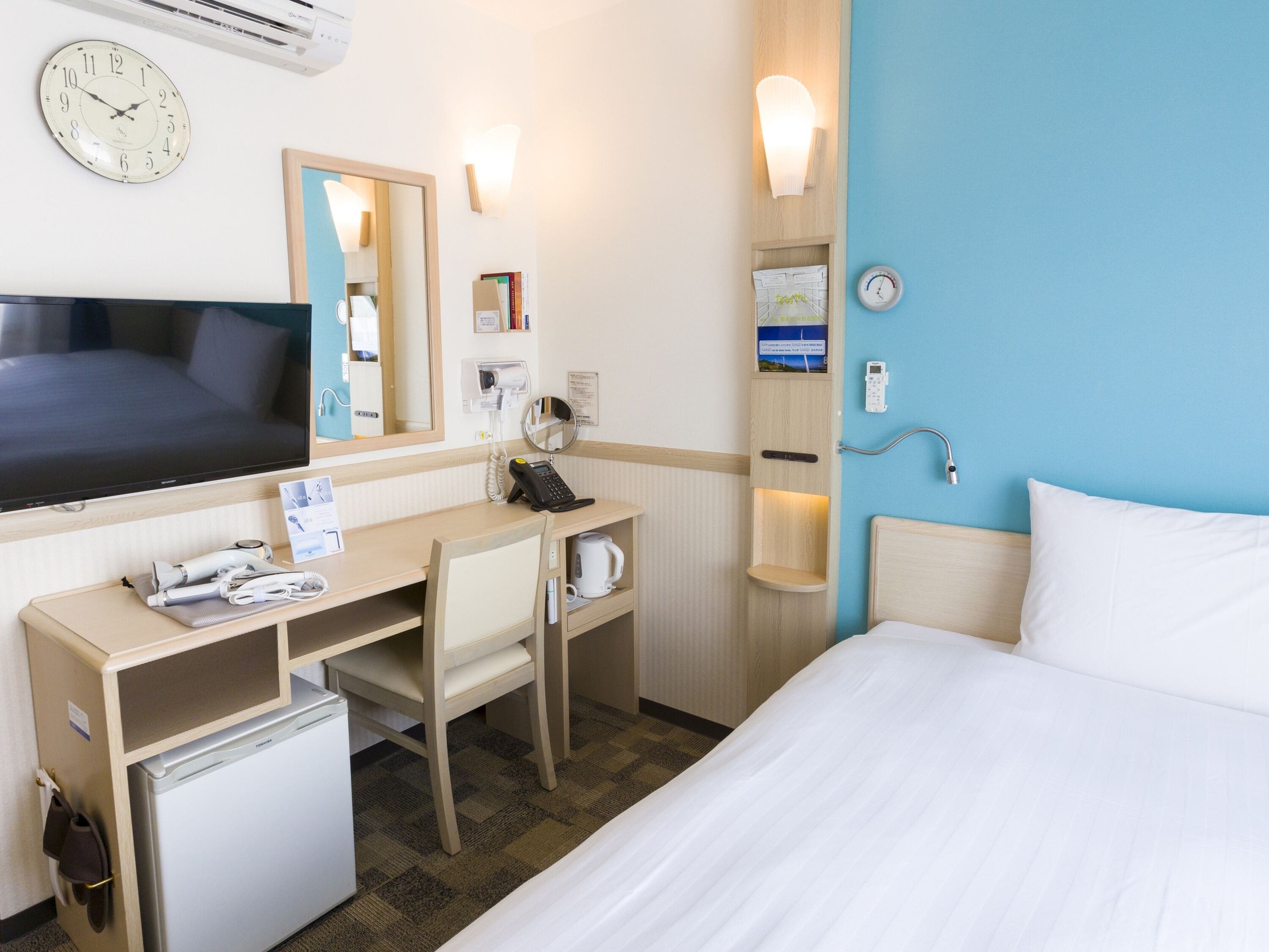 Desk, blackout curtains, iron/ironing board, free wired Internet