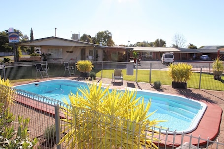 Outdoor pool. Crossroads Motel
