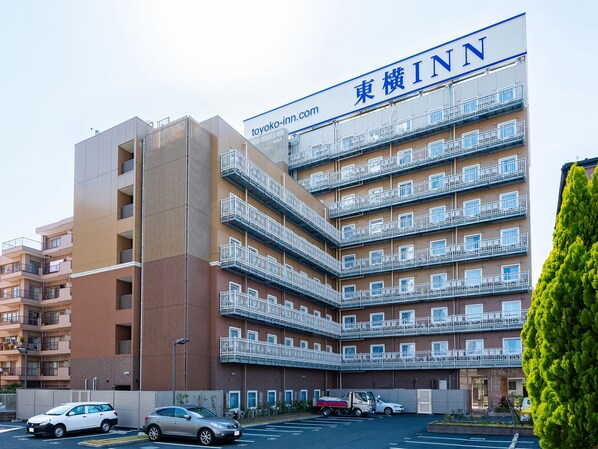 A multi-story building with a prominent sign reading "Toyoko Inn". - Toyoko Inn Kawaguchi Ekimae (Kawaguchi)