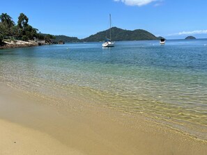 On the beach, sun loungers