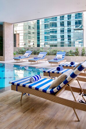 Indoor pool, open 6:00 AM to 10:00 PM, sun loungers
