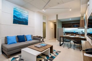 Suite, 1 Bedroom | Living area | 43-inch LED TV with cable channels, TV - The Sphere Serviced Residences Managed by HII (Makati)